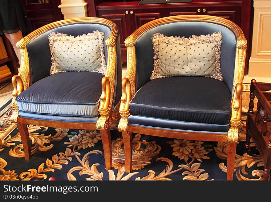 Beautiful and decorative chair sitting on carpet and/or tile floor. Beautiful and decorative chair sitting on carpet and/or tile floor