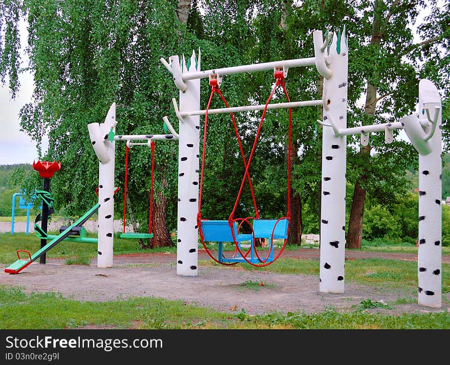 Teeter-totter outdoor in summer day