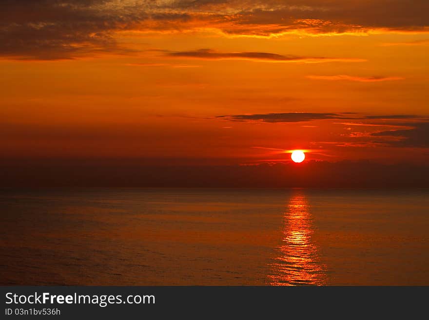 Sunset on shore of the Baltic Sea.