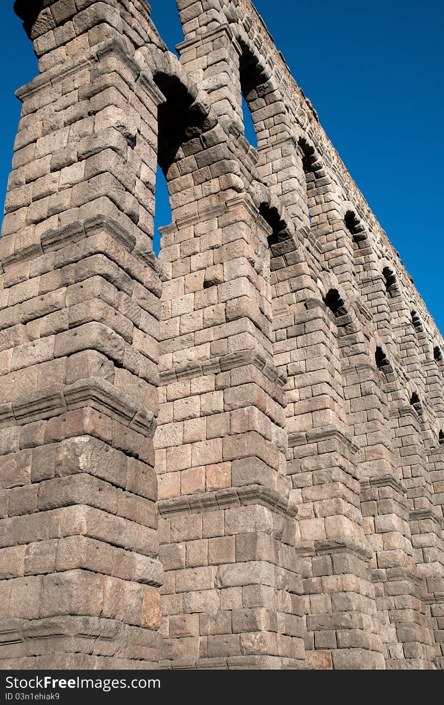 Evening view of Roman aqueduct of Segovia, Spain