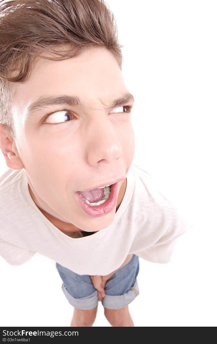 Portrait of a young man with facial expression isolated on white