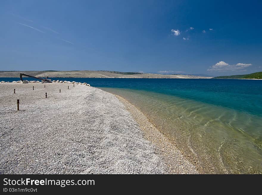 Lovely pebble beach in Jadranovo with the crystal clear sea. Lovely pebble beach in Jadranovo with the crystal clear sea