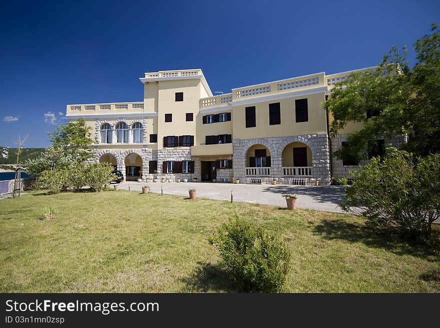 Old yellow renovated villa on the waterfront of Kraljevica with the park. Old yellow renovated villa on the waterfront of Kraljevica with the park