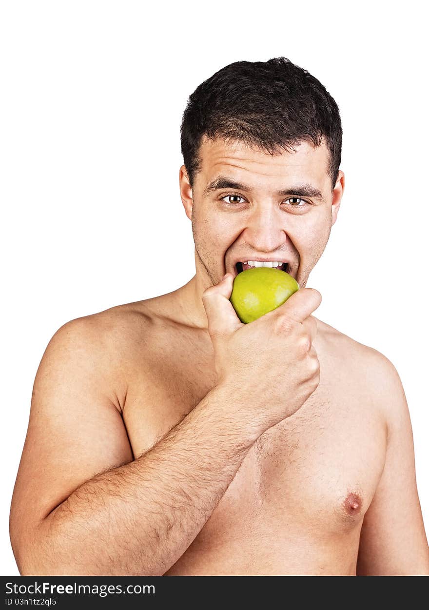 Happy man eating green apple. Happy man eating green apple