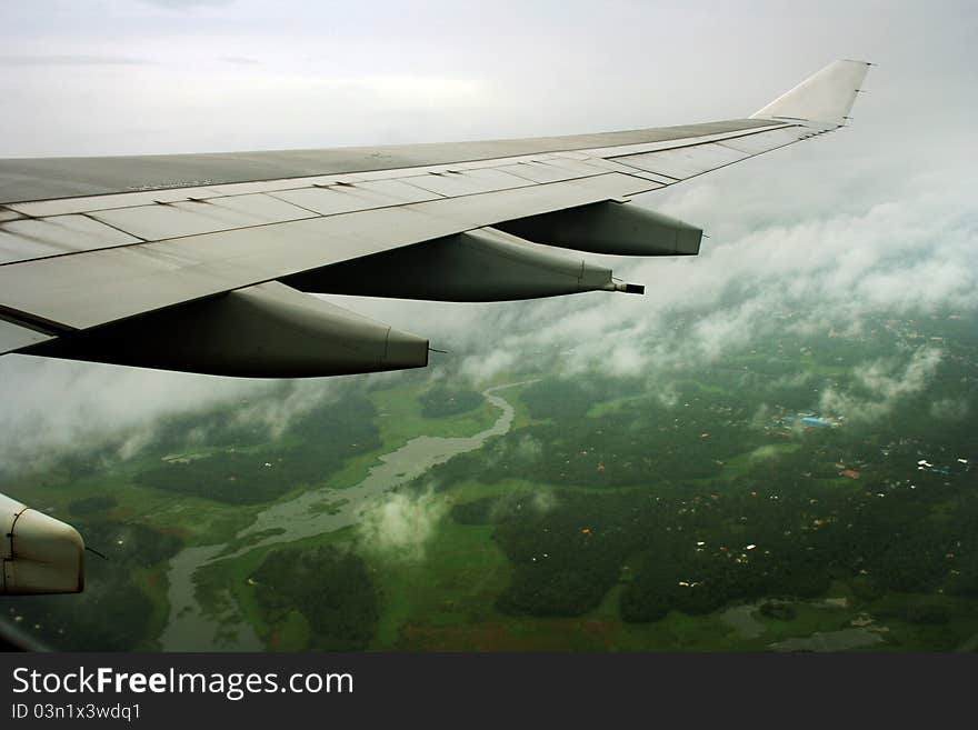 Flying over green landscape