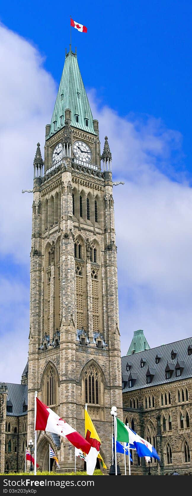 The Canadian Parliament Peace Tower with provincial flags. The Canadian Parliament Peace Tower with provincial flags.