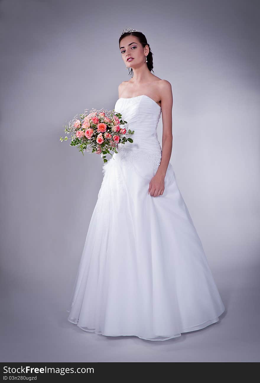 Women in wedding dress with flowers