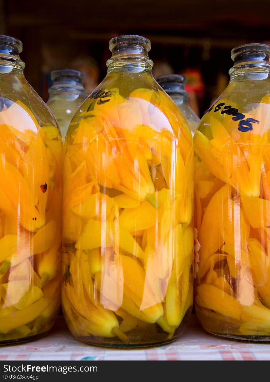 Yellow Flowers  In  Bottle