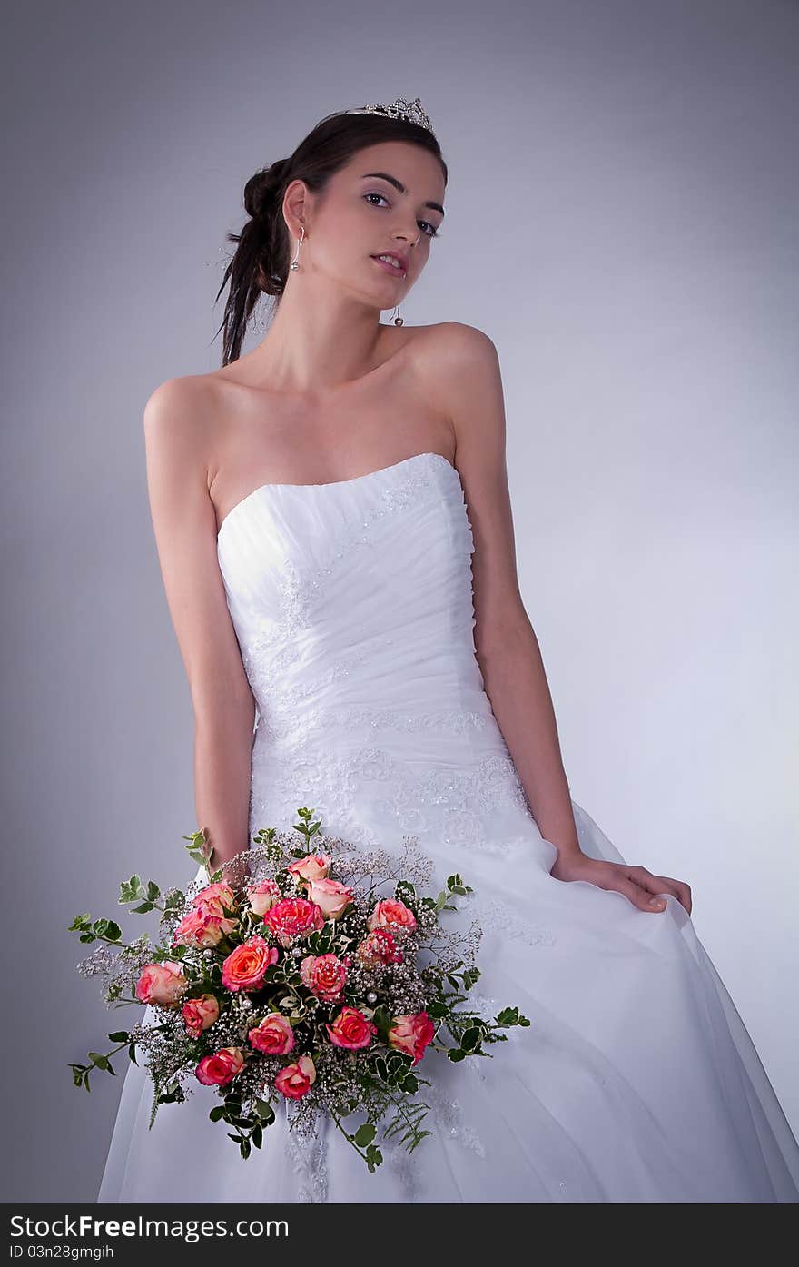 Women in wedding dress with flowers