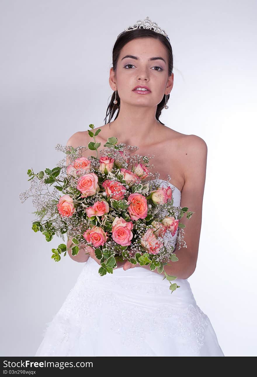 Women in wedding dress with flowers