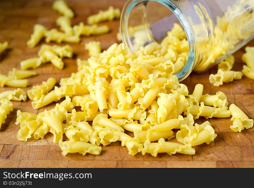 Raw noodles on a wood