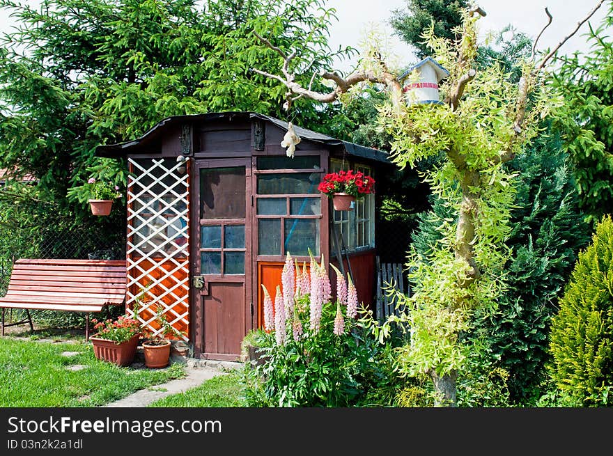 Wooden gazebo used for resting in the shade.