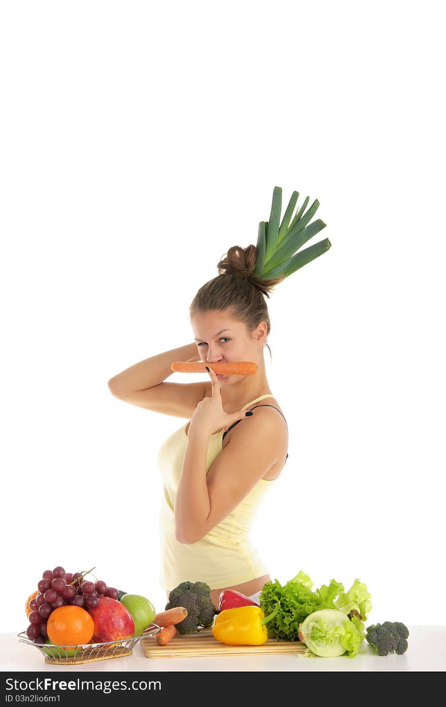 Woman with fruits and vegetables isolated on white