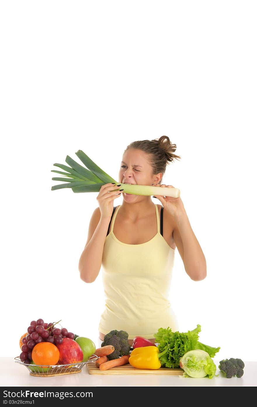 Woman with fruits and vegetables isolated on white