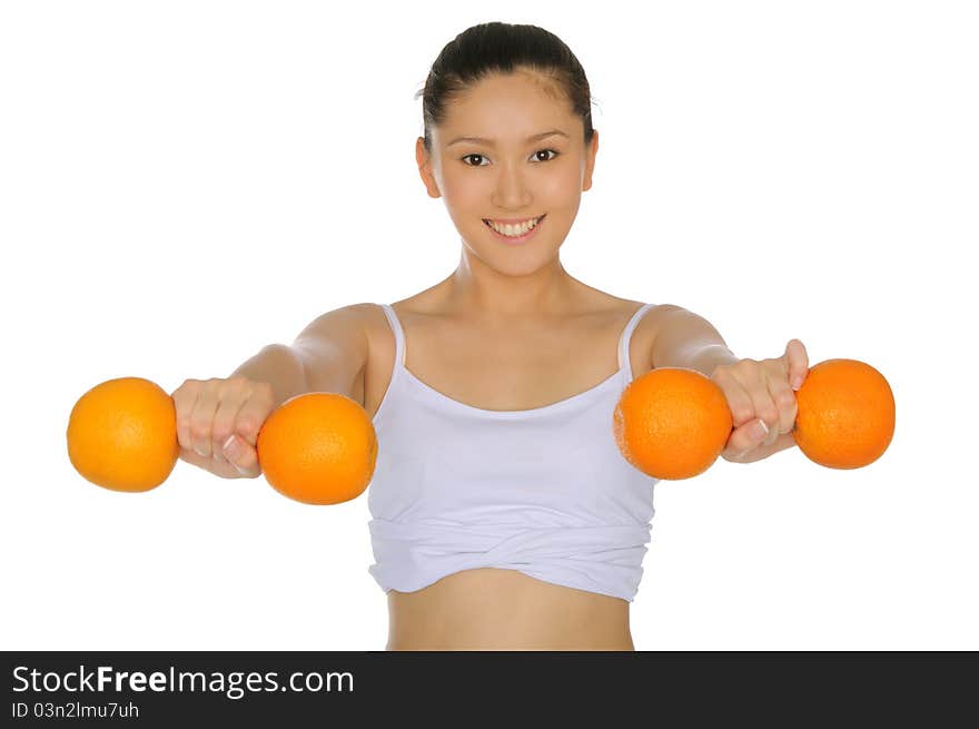 Asian Woman Engaged In Fitness Of Oranges