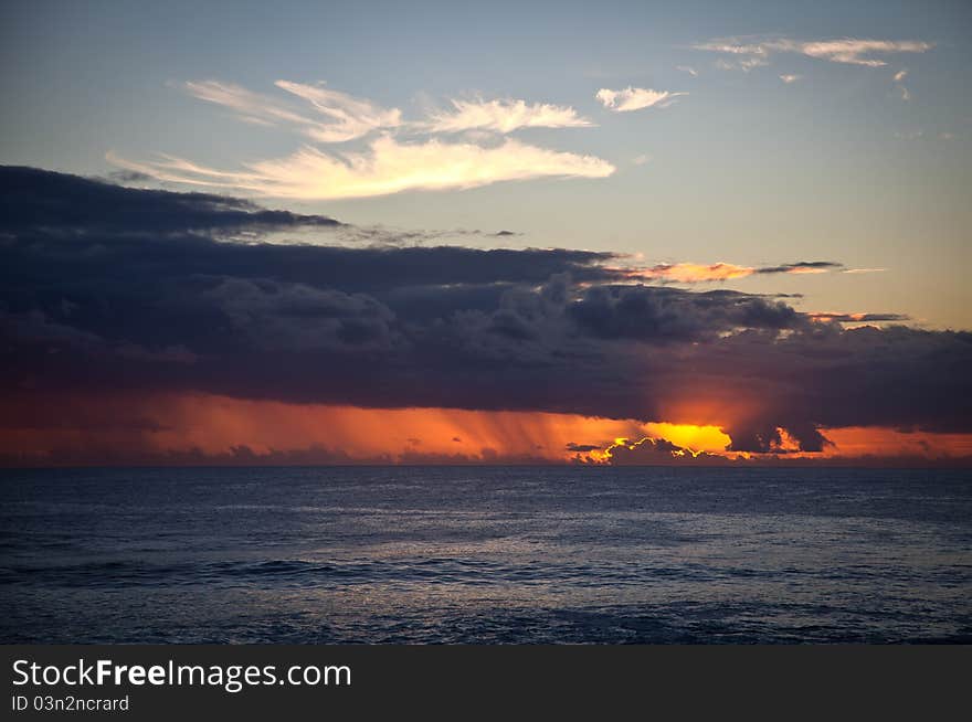 Easter Island Statue in the sunset above pacific ocean