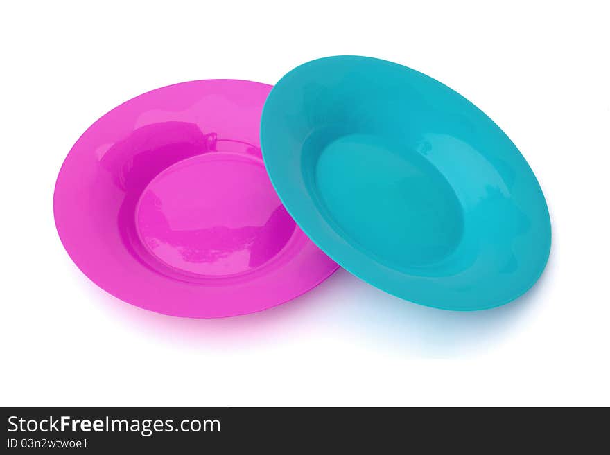 Two of color plastic dish on white background.