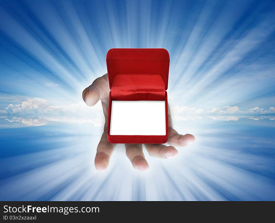 Empty red box in human hand for give idea. Empty red box in human hand for give idea.