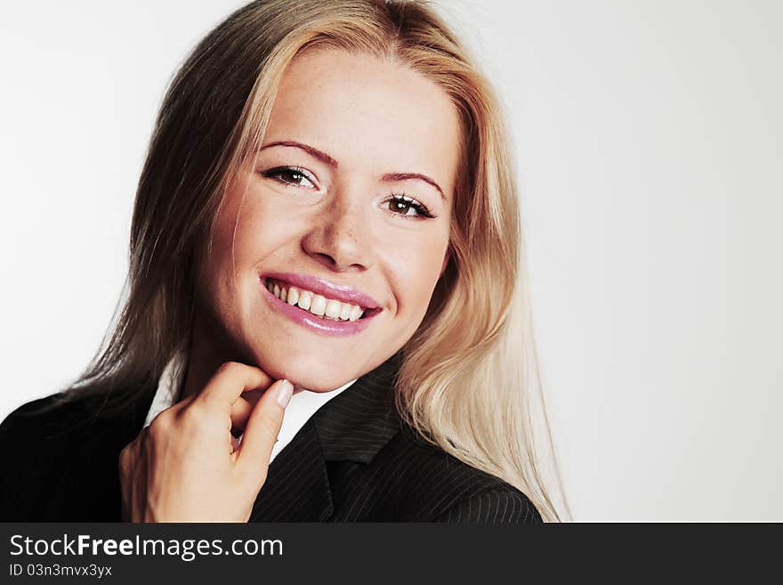 Business woman on a gray background