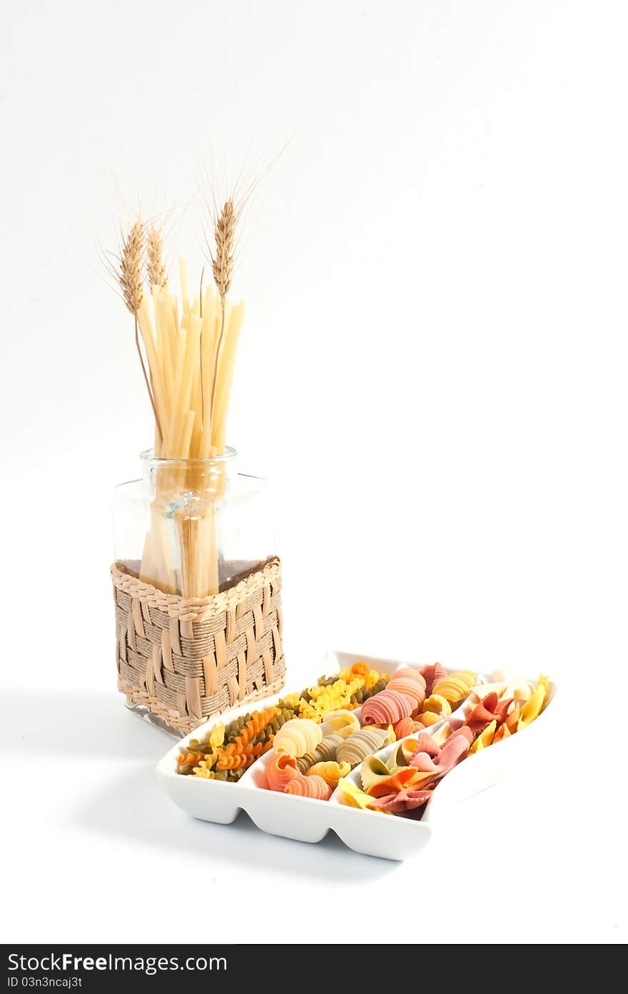 Different kinds of italian pasta on white background