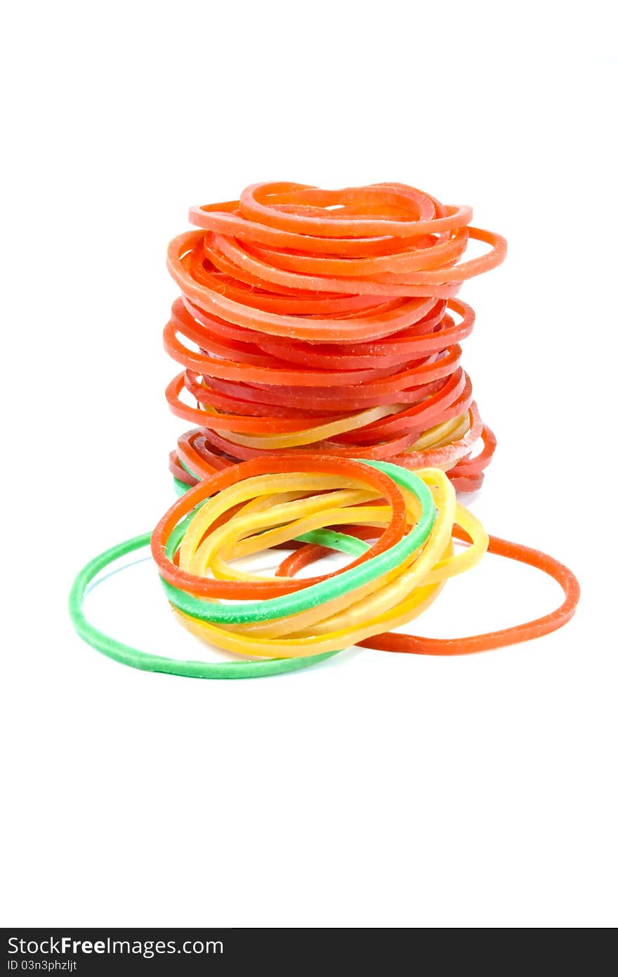 Set of multi-coloured elastic bands placed vertically. Set of multi-coloured elastic bands placed vertically.