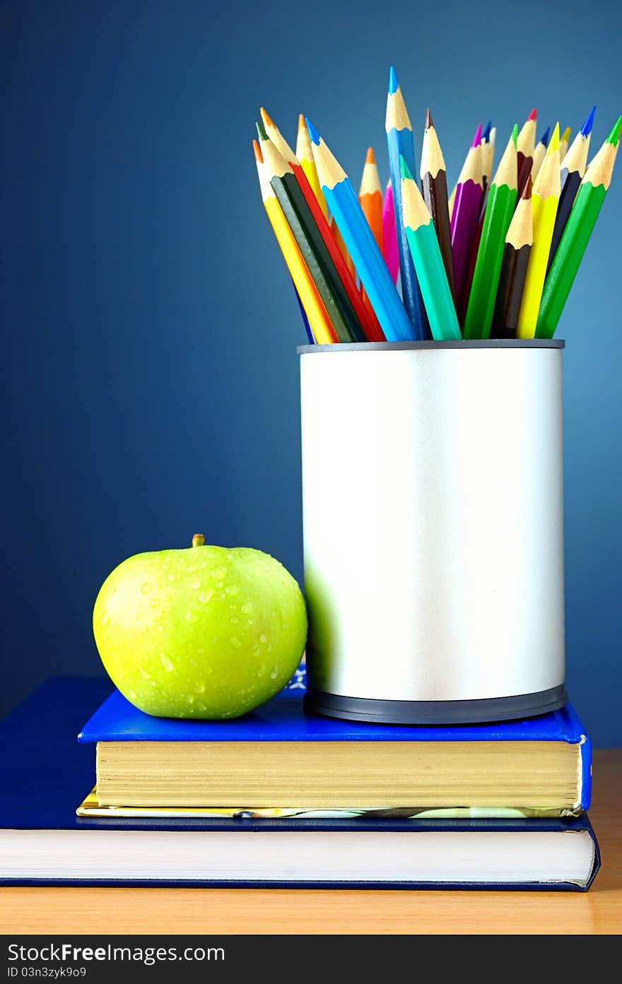 Pencils And Books On The Table