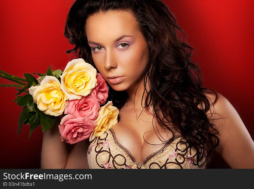 Beautiful young lady with roses. Beautiful young lady with roses