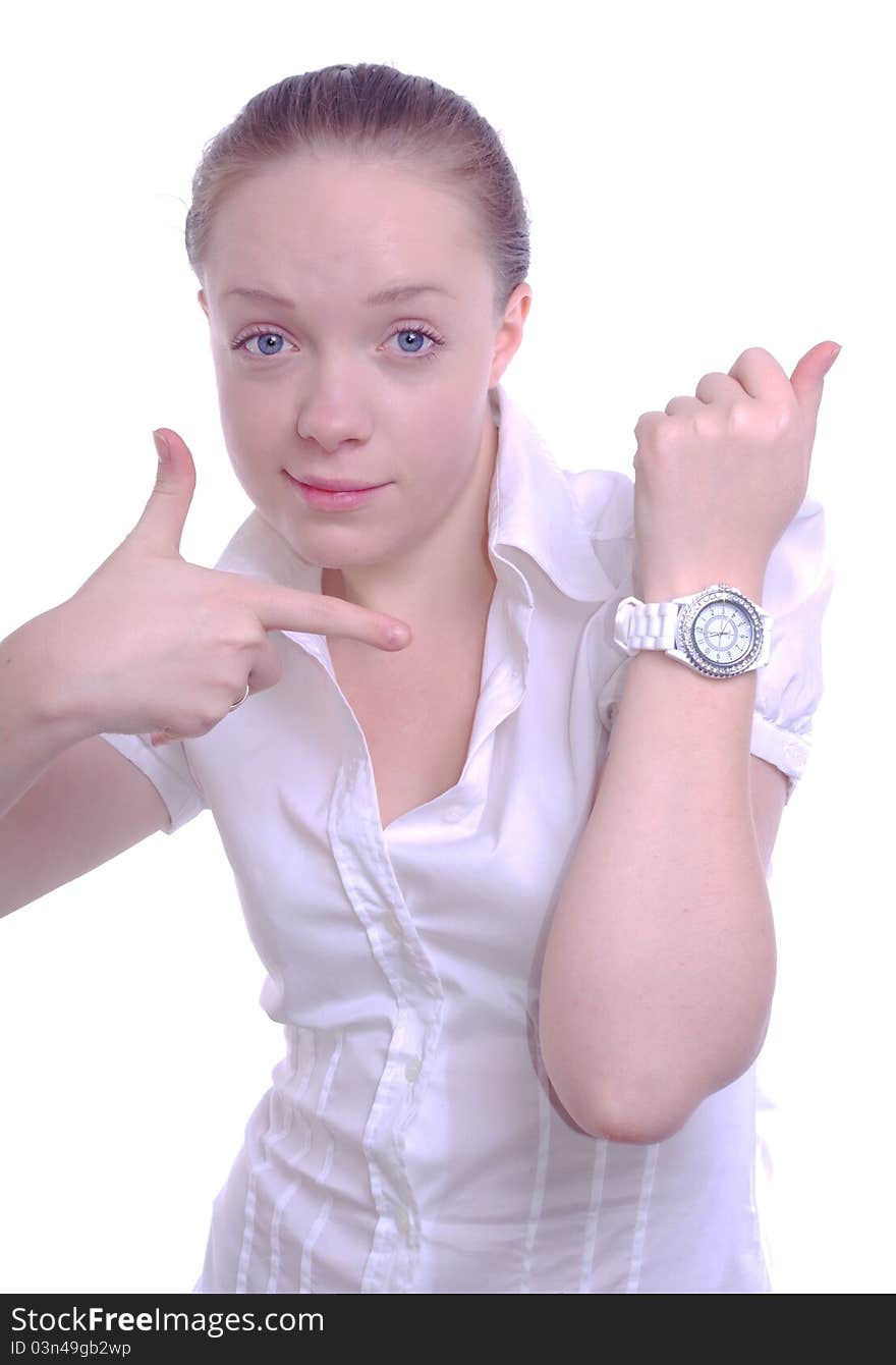 Young businesswoman pointing to her watch. Young businesswoman pointing to her watch