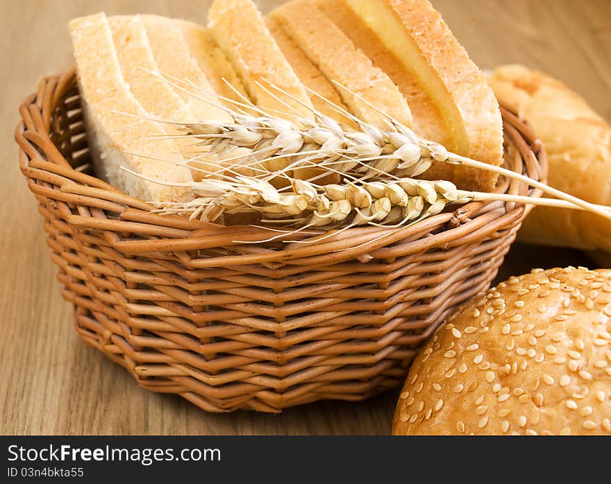 Bread and wheat on the table