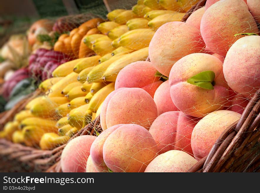 Ripe fruits and vegetables in baskets