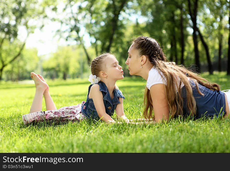 Mother with her daughter outside