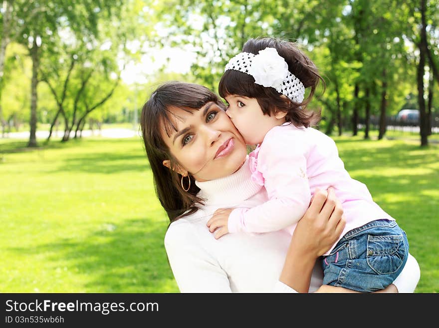 Mother With Her Daughter Outside