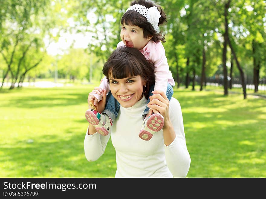 Mother with her daughter outside