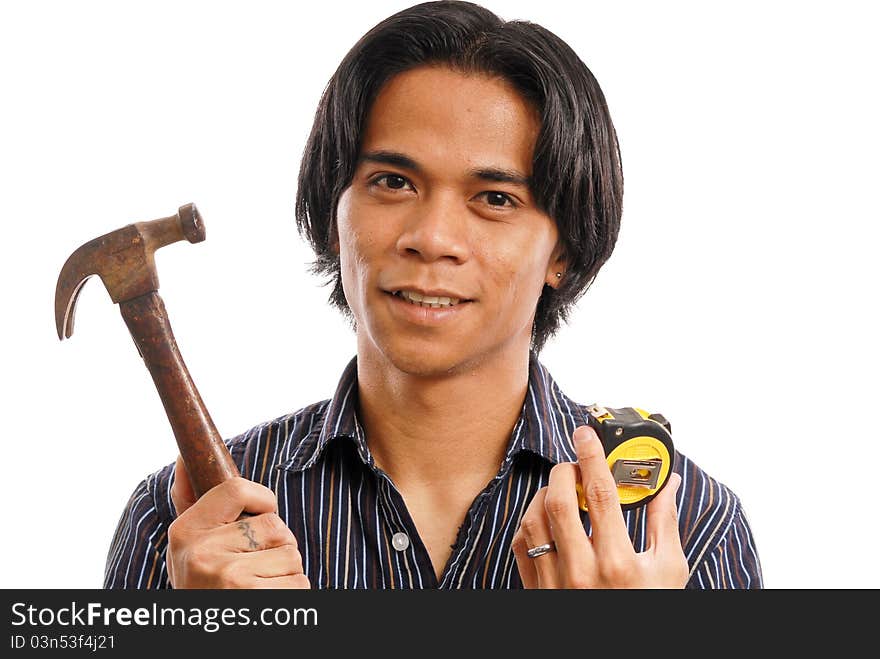 Man With Hammer And Industrial Tape Measure. Man With Hammer And Industrial Tape Measure