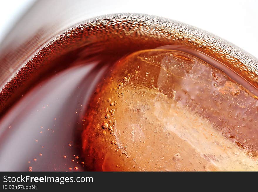 Drink with ice cube close up