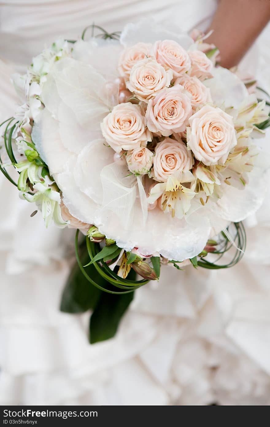 Wedding bouquet of beige roses