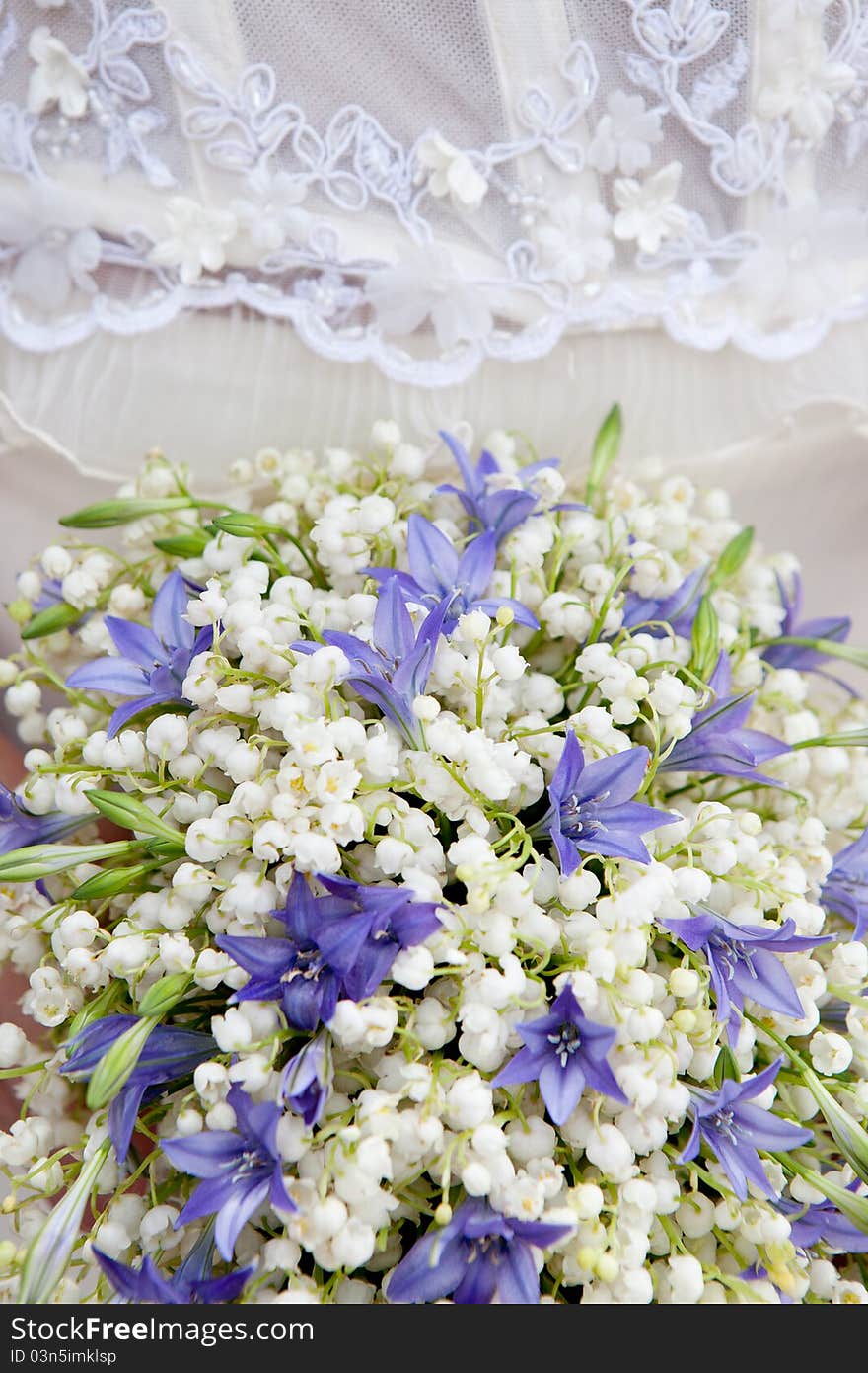 Closeup shot of wedding bouquet made from lily of the valley