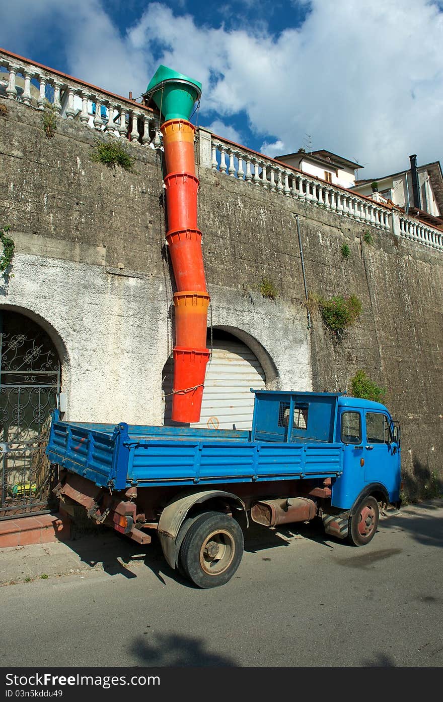 Drain construction site debris in Italy