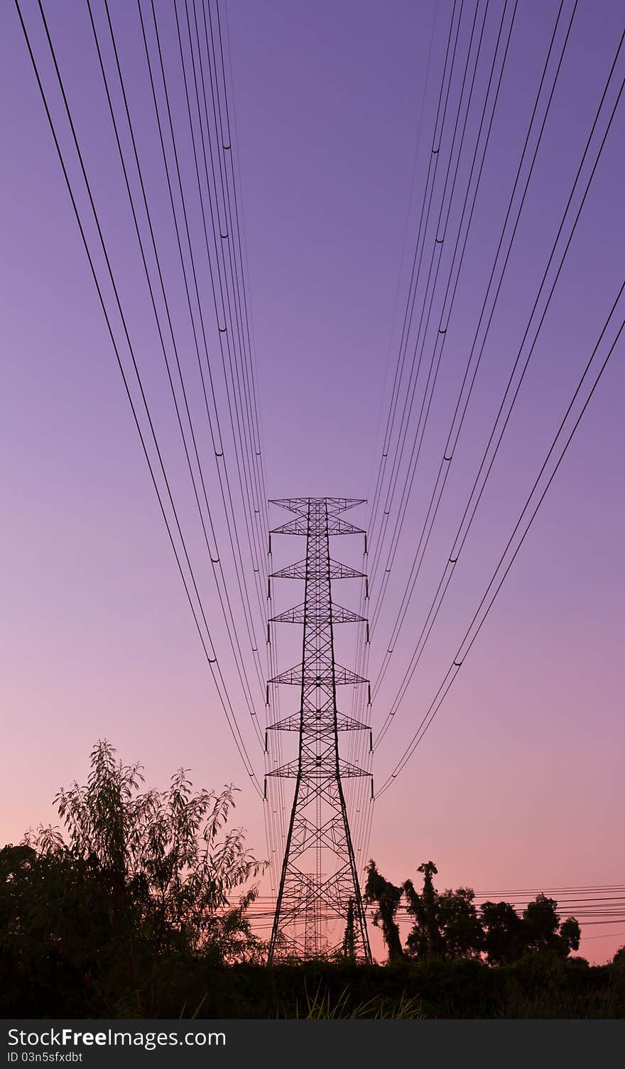 Electric high voltage power post with beautiful sky