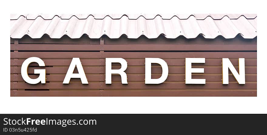 The garden text sign under the roof isolated on white