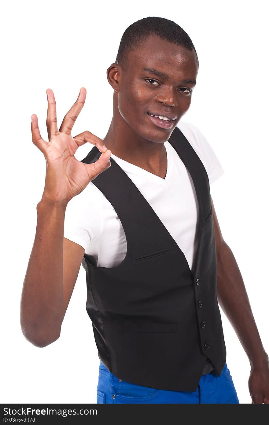 Young and beautiful black man doing ok sign