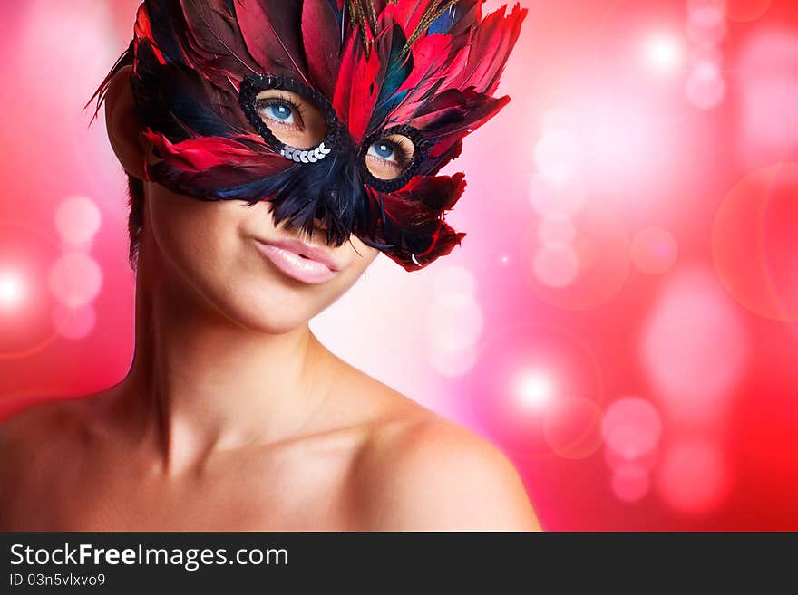 Portrait of beautiful woman in mask