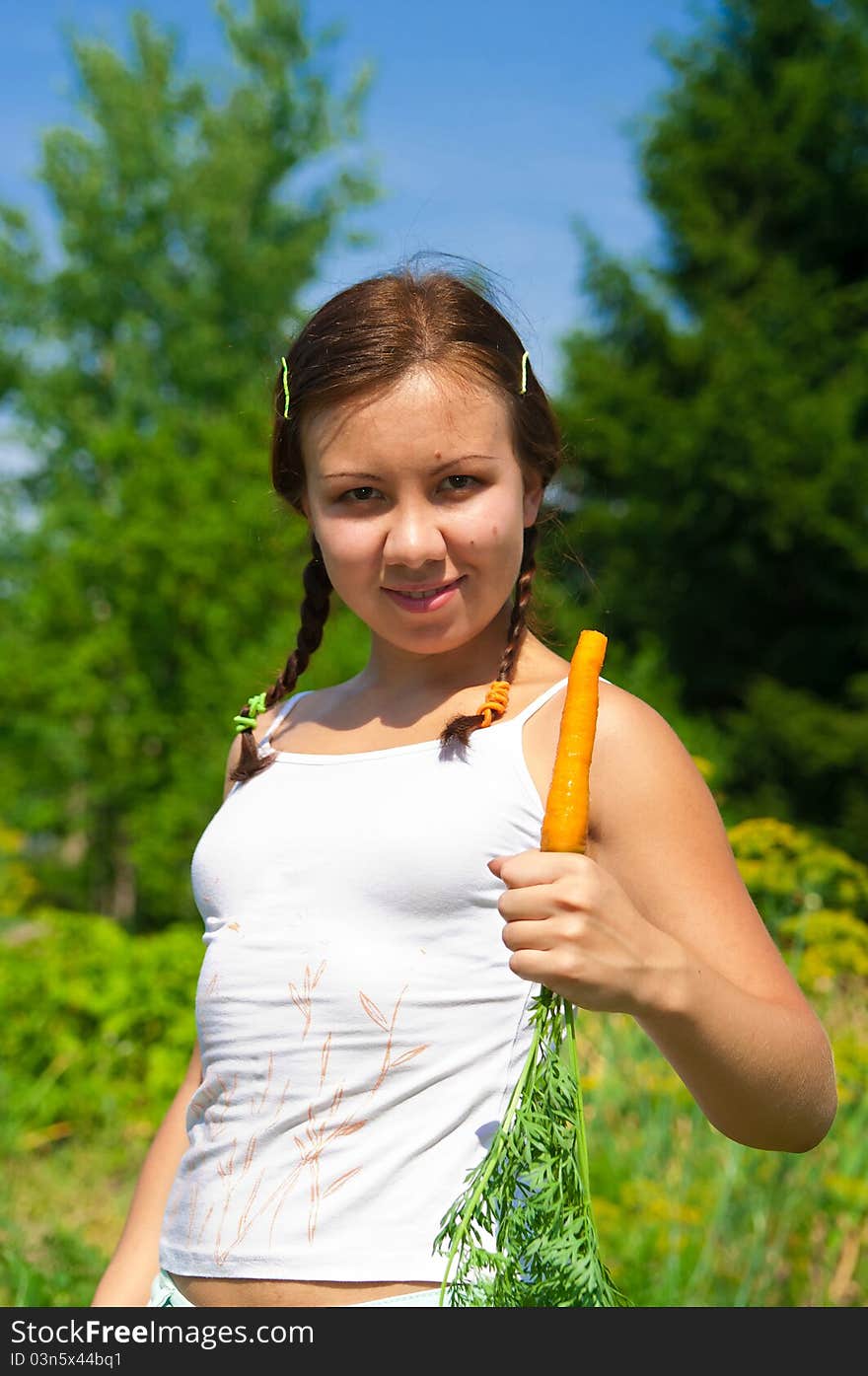 Woman Holding Carrot