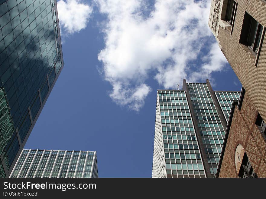 The towers on background of blue sky with clouds