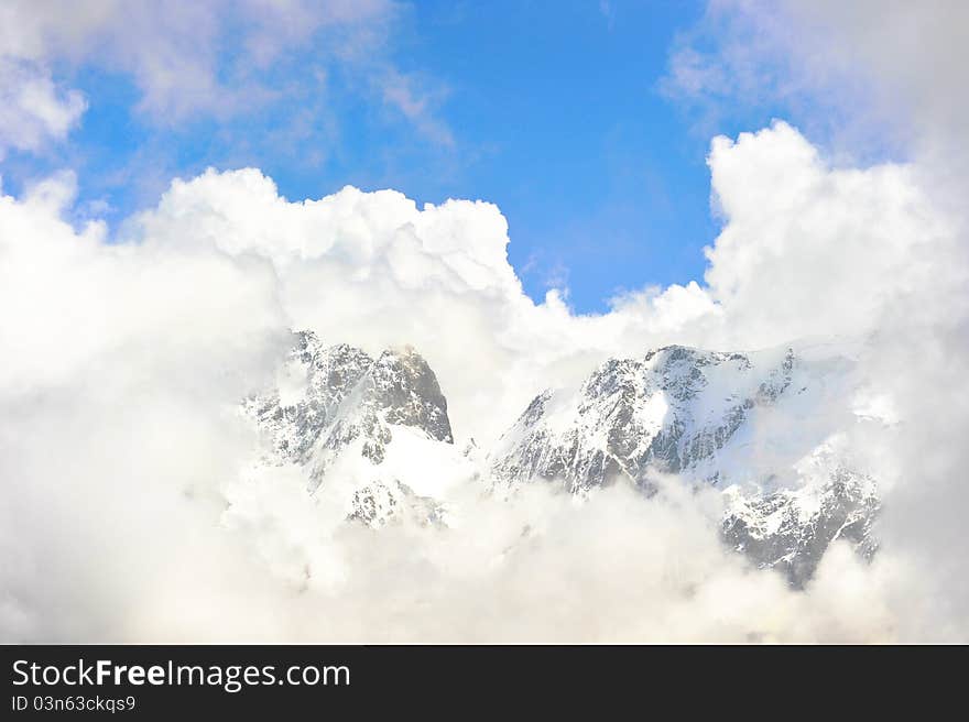 Top of High mountains, covered by snow.