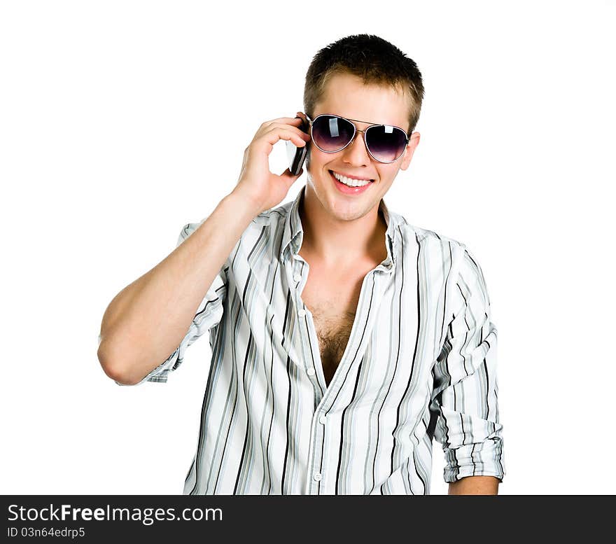 Young man with a phone. White background