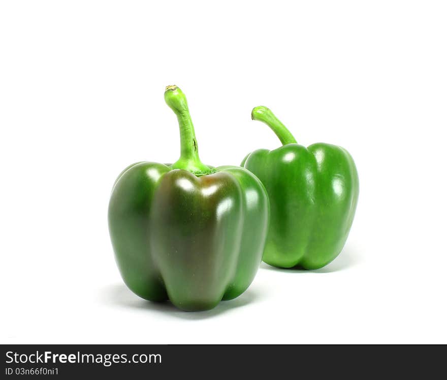 Fresh green pepper isolated on white