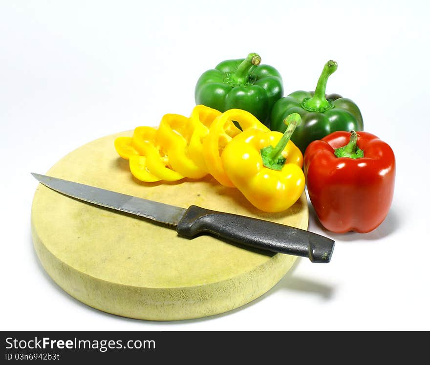 Fresh green, yellow and red peppers