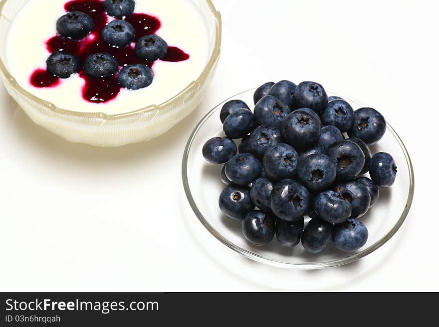 Picture of natural blueberry on creamy yogurt. Picture of natural blueberry on creamy yogurt