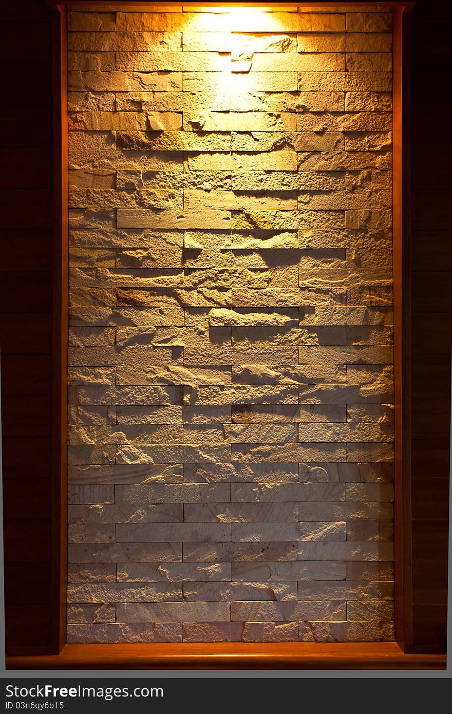 Stone walls are decorated with lights. Stone walls are decorated with lights